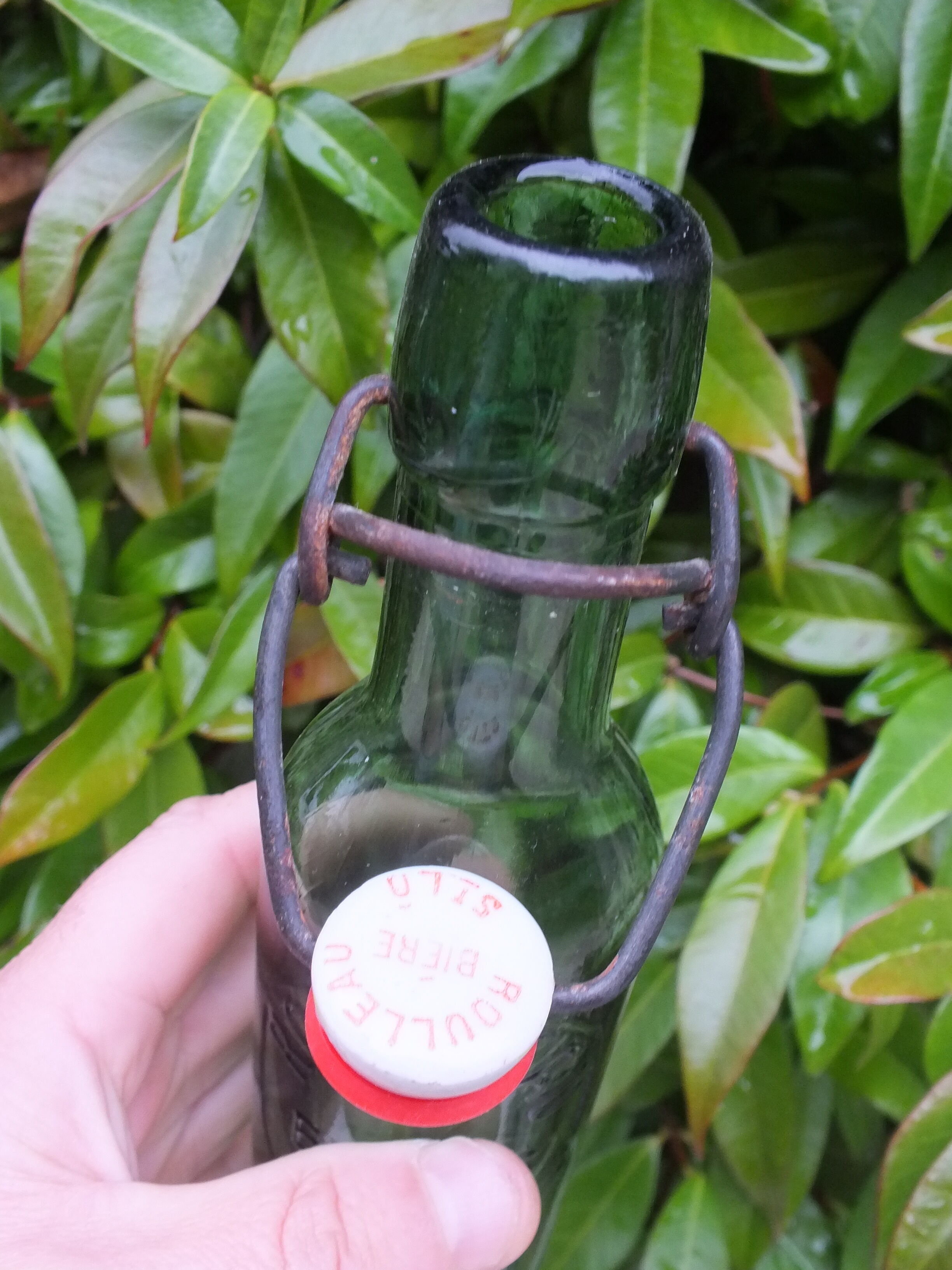 Old bottle of Roulleau beer in Saint Lô (Manche)