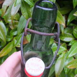 Ancienne bouteille de bière Roulleau à Saint Lô (Manche)