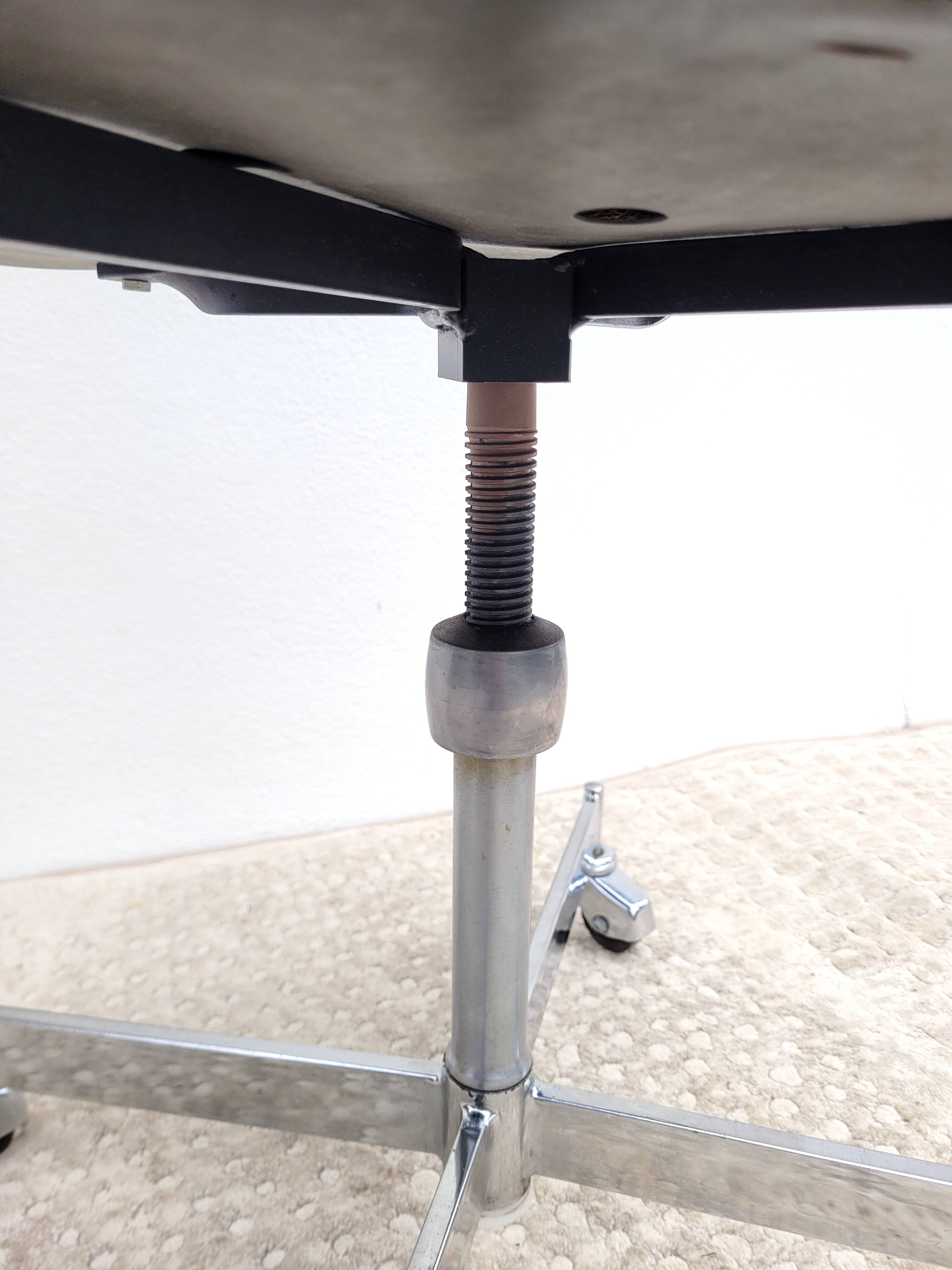 Vintage swivel office chair with casters