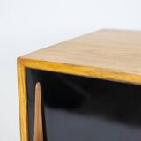 Low ash sideboard with sliding doors. 1960s.