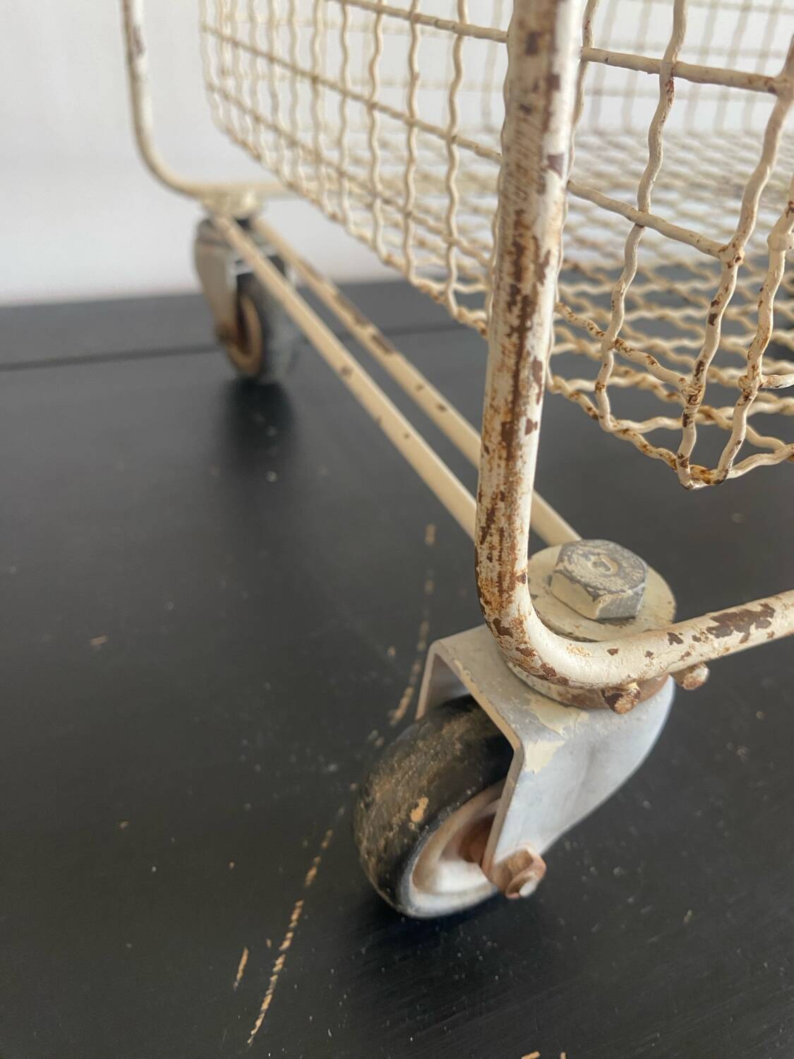 Metal serving trolley on wheels
