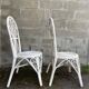 Pair of white peacock rattan chairs, circa 1960