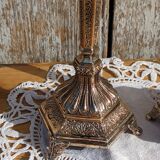 Pair of chiseled metal candle holders