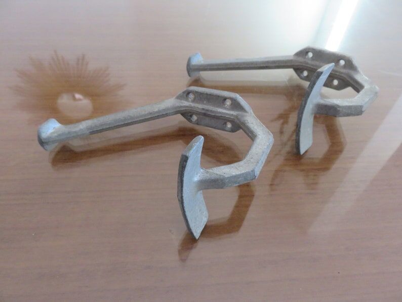 Pair of aluminum coat racks 30 years 40