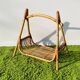 Rattan magazine rack. Vintage 50s.