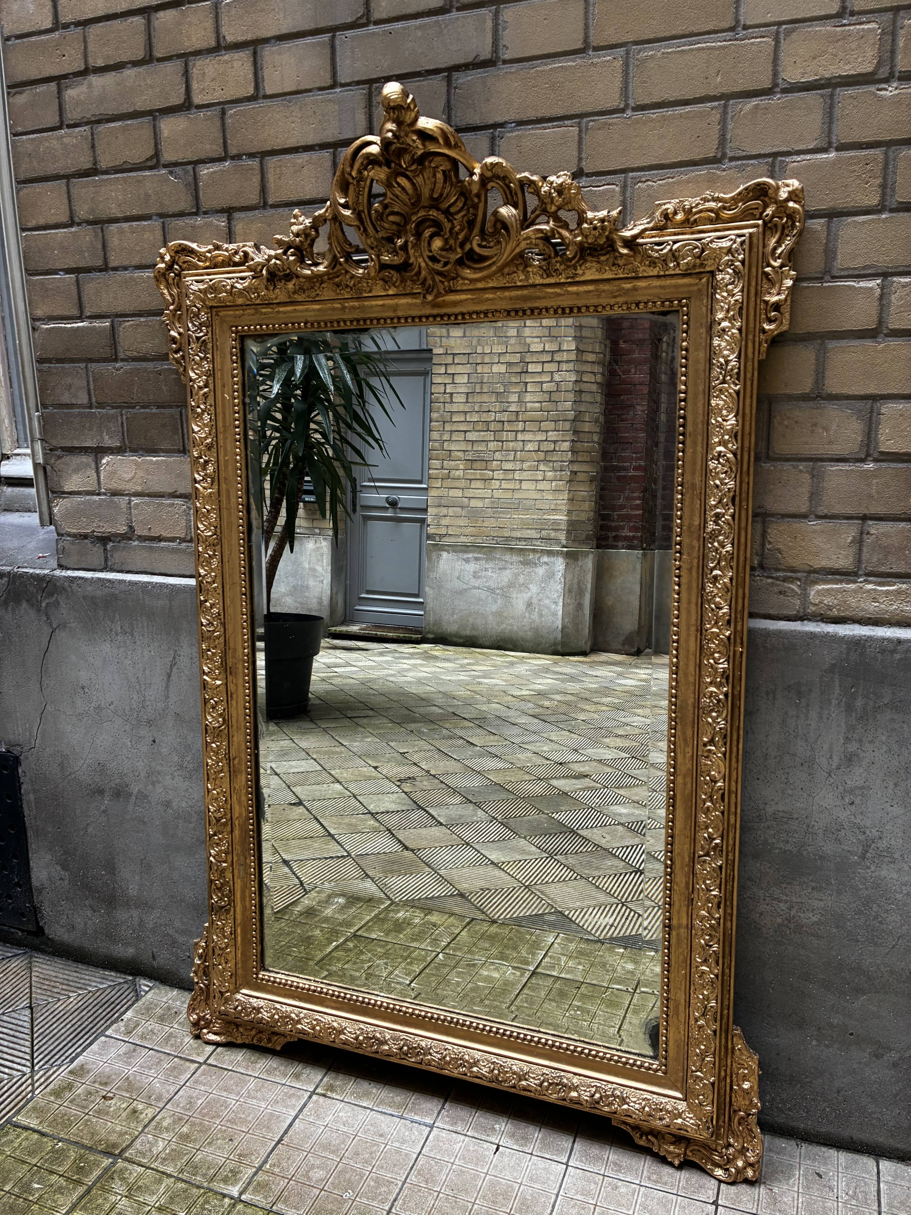 Large antique mirror in Louis XV style