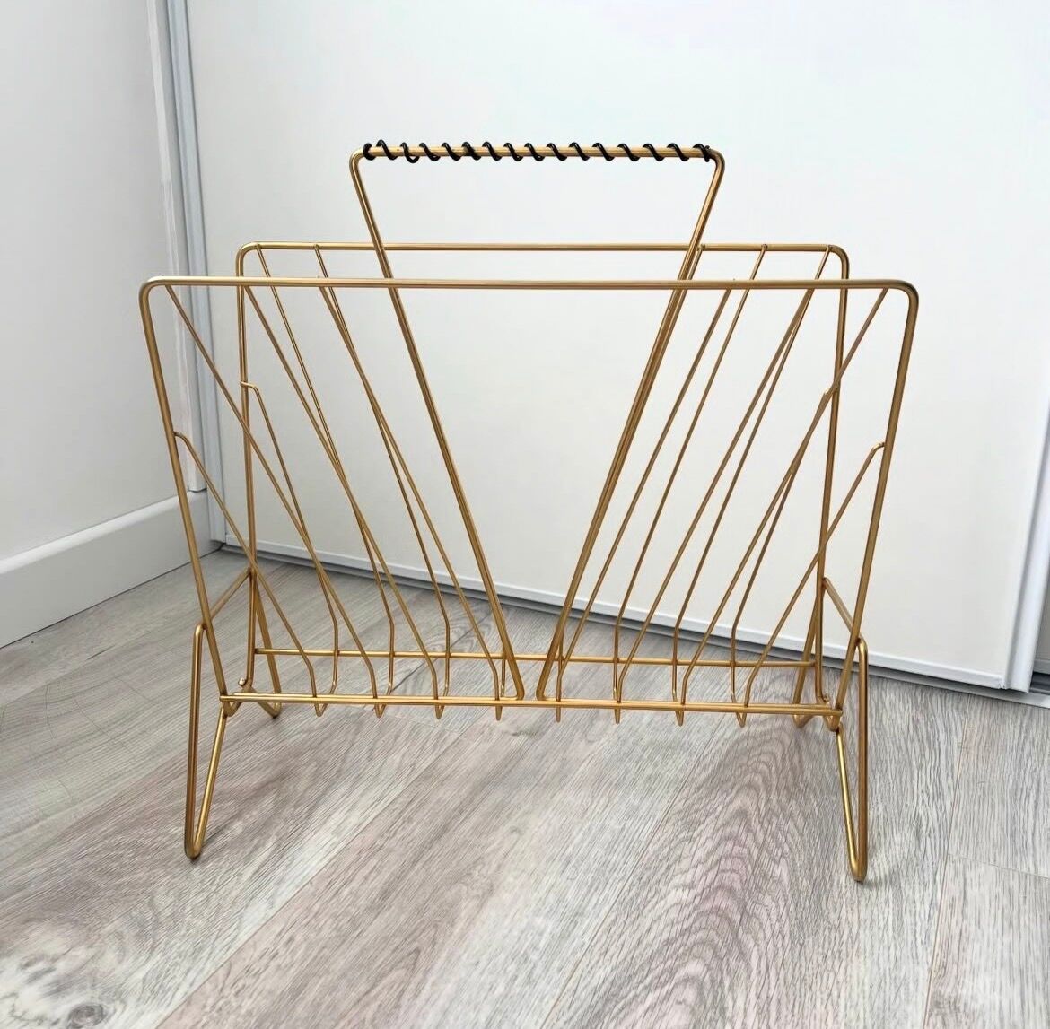 Vintage gold metal magazine rack