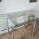 High table with tempered glass and chrome base.