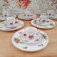 Lot de 6 tasses à café et sous-tasses décor fleuri et liseré doré, porcelaine de Limoges Bernardaud