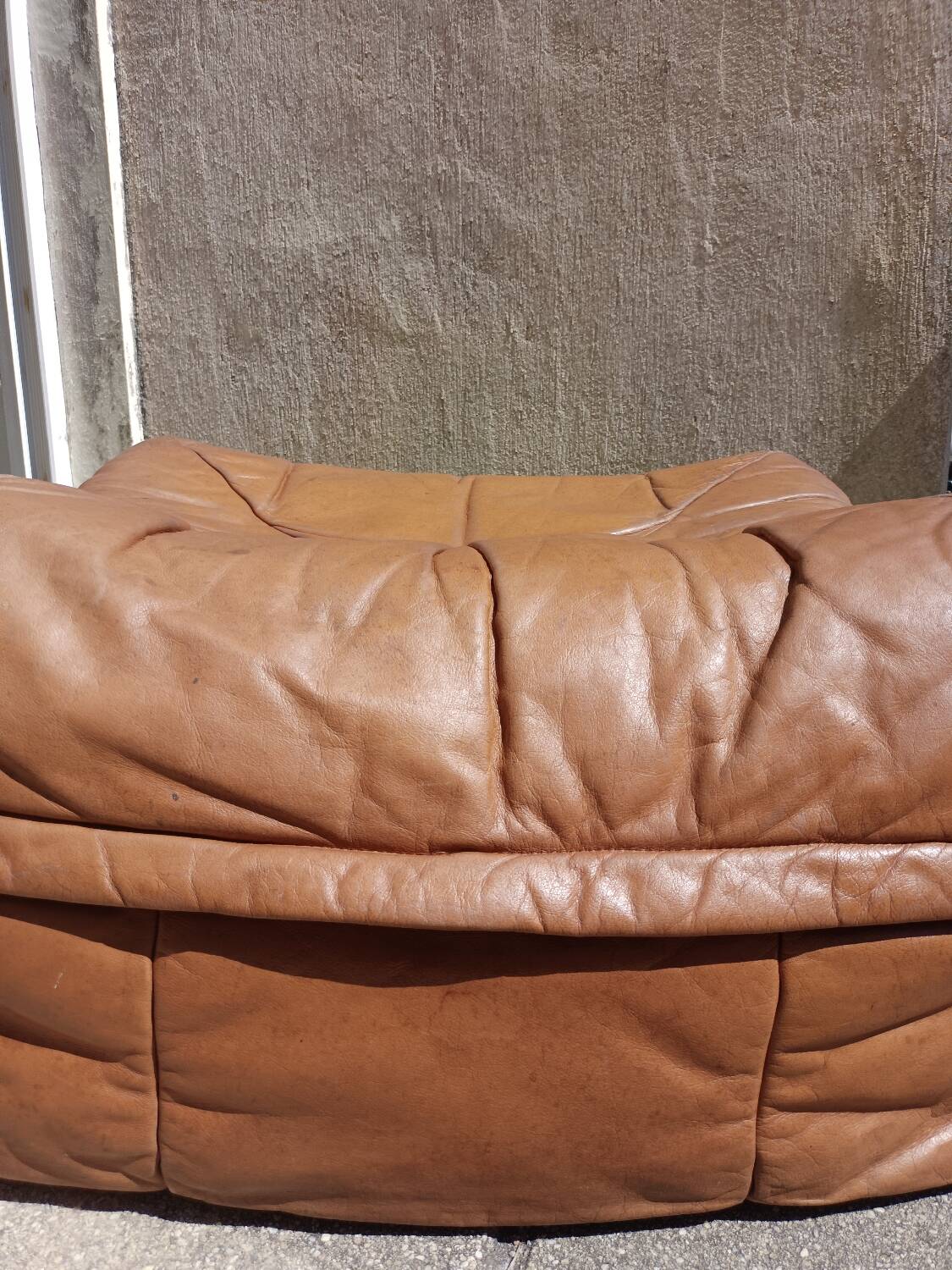 Vintage leather pouf