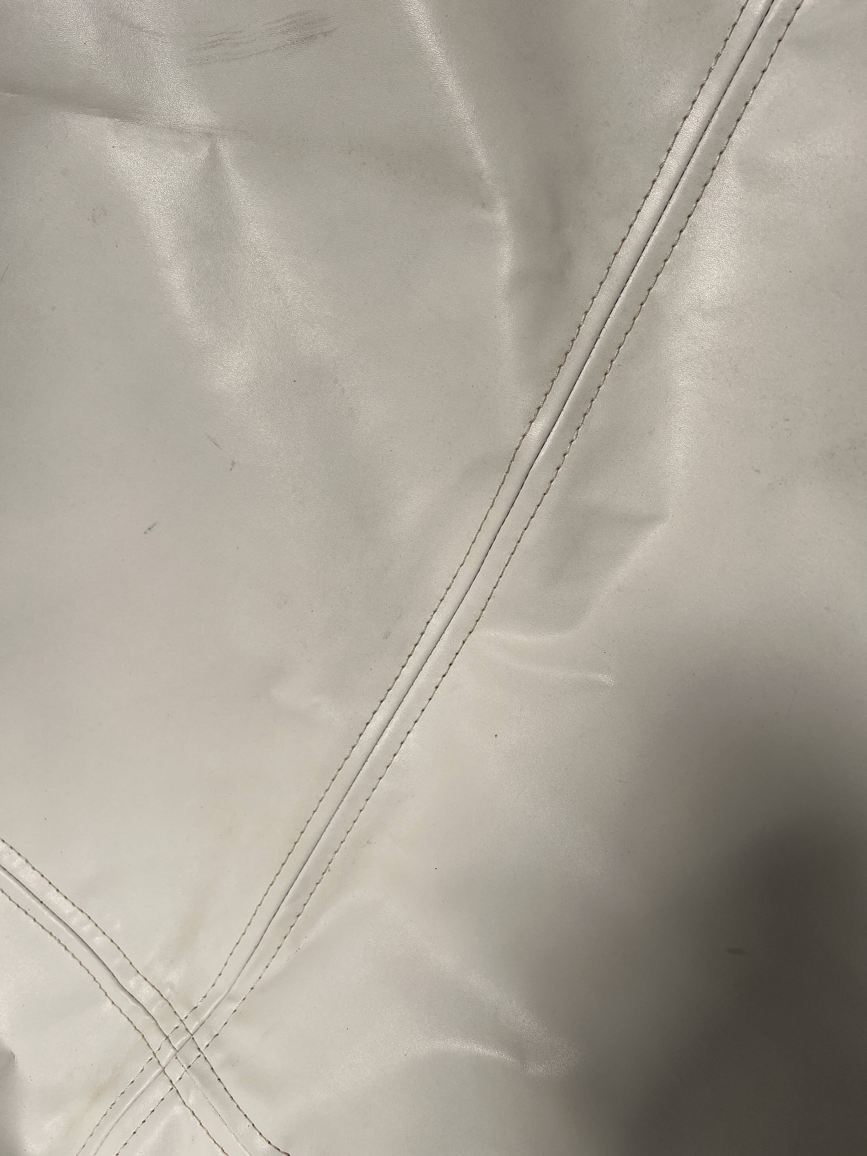 Pair of white leatherette butterfly chairs