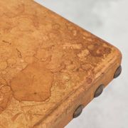 Brutalist coffee table in solid oak, metal, and patinated leather, 1940s.