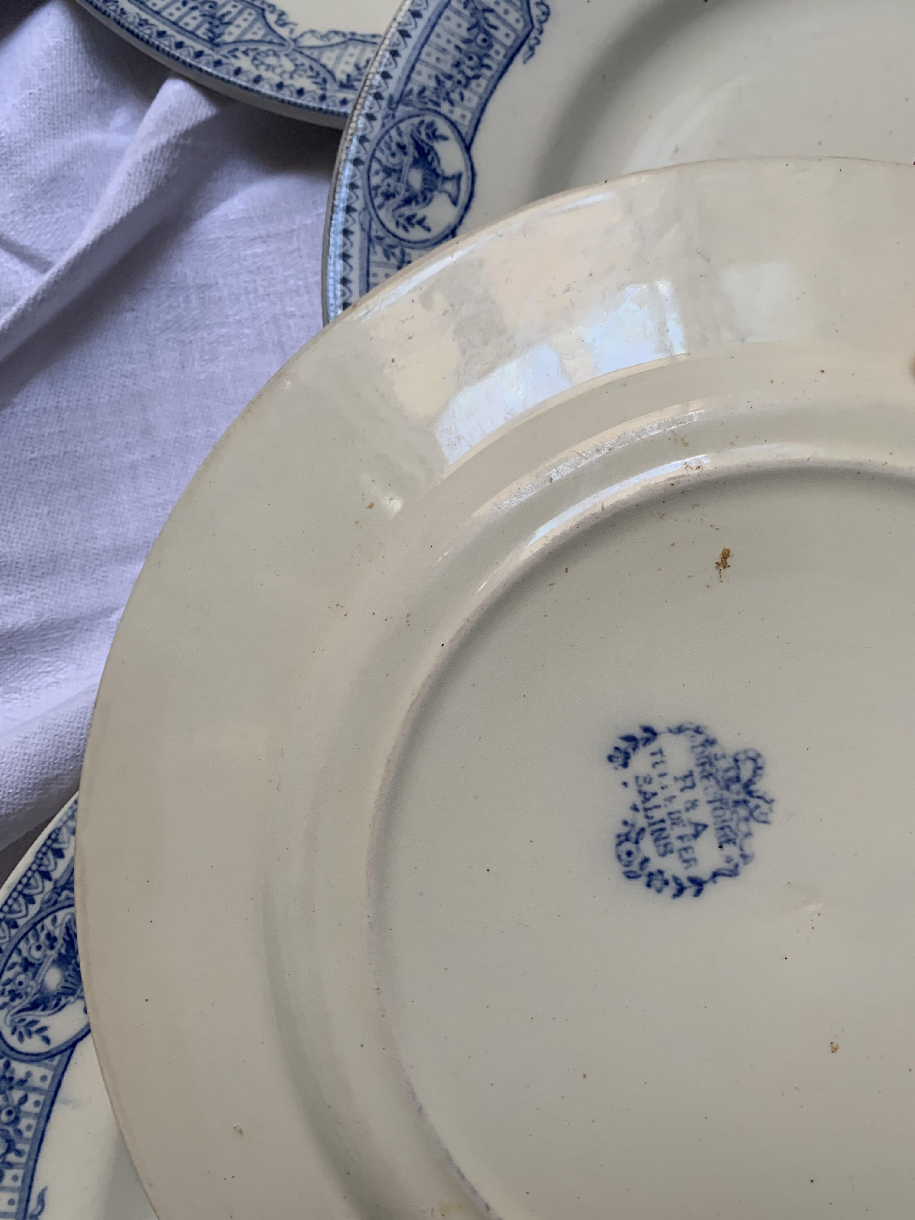 Set of flat blue plates