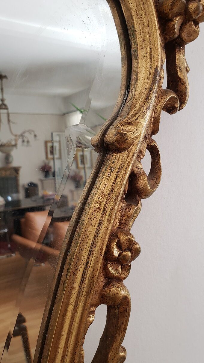 Beveled mirror and gilded wood
