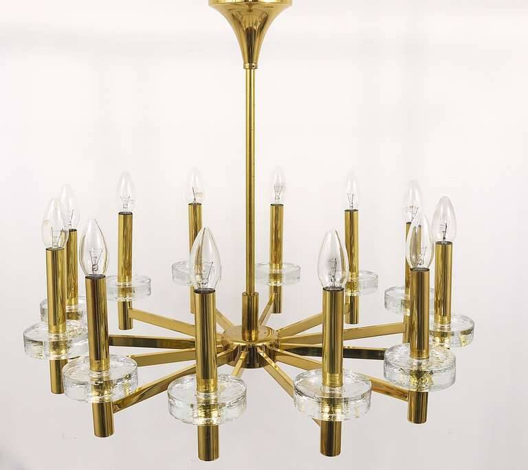 Brass and glass disc pendant light in the style of Gaetano Sciolari, mid-century, Italy, 1970s.