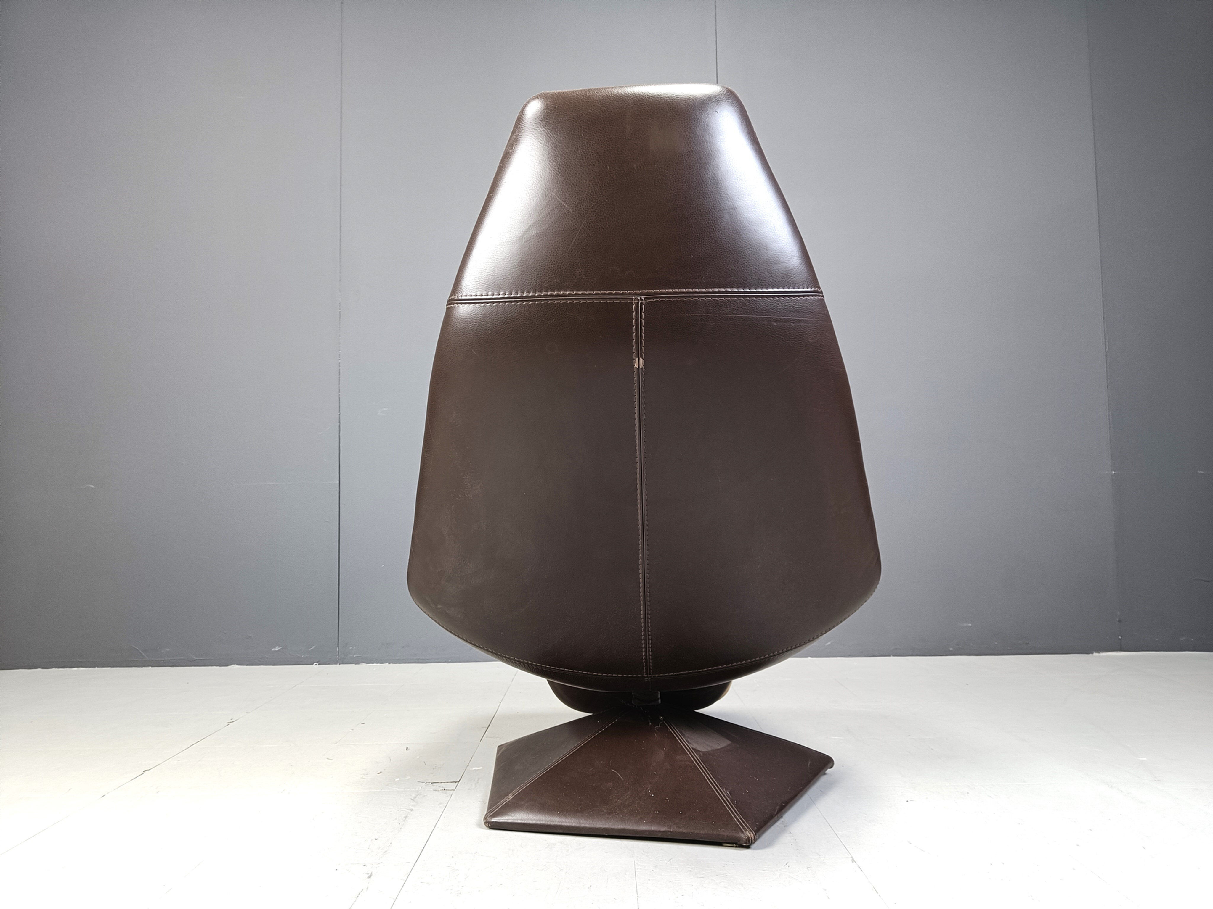 Vintage leather swivel chair with ottoman, 1970s