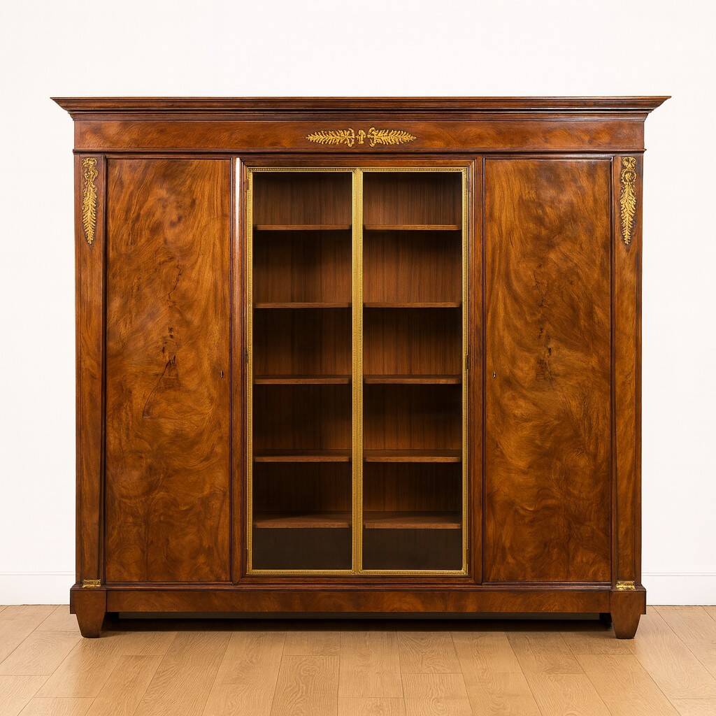 Bibliothèque en acajou flammé style Empire vers 1900