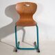 Vintage turquoise blue school chairs (c.1950). Set of 4 pieces.