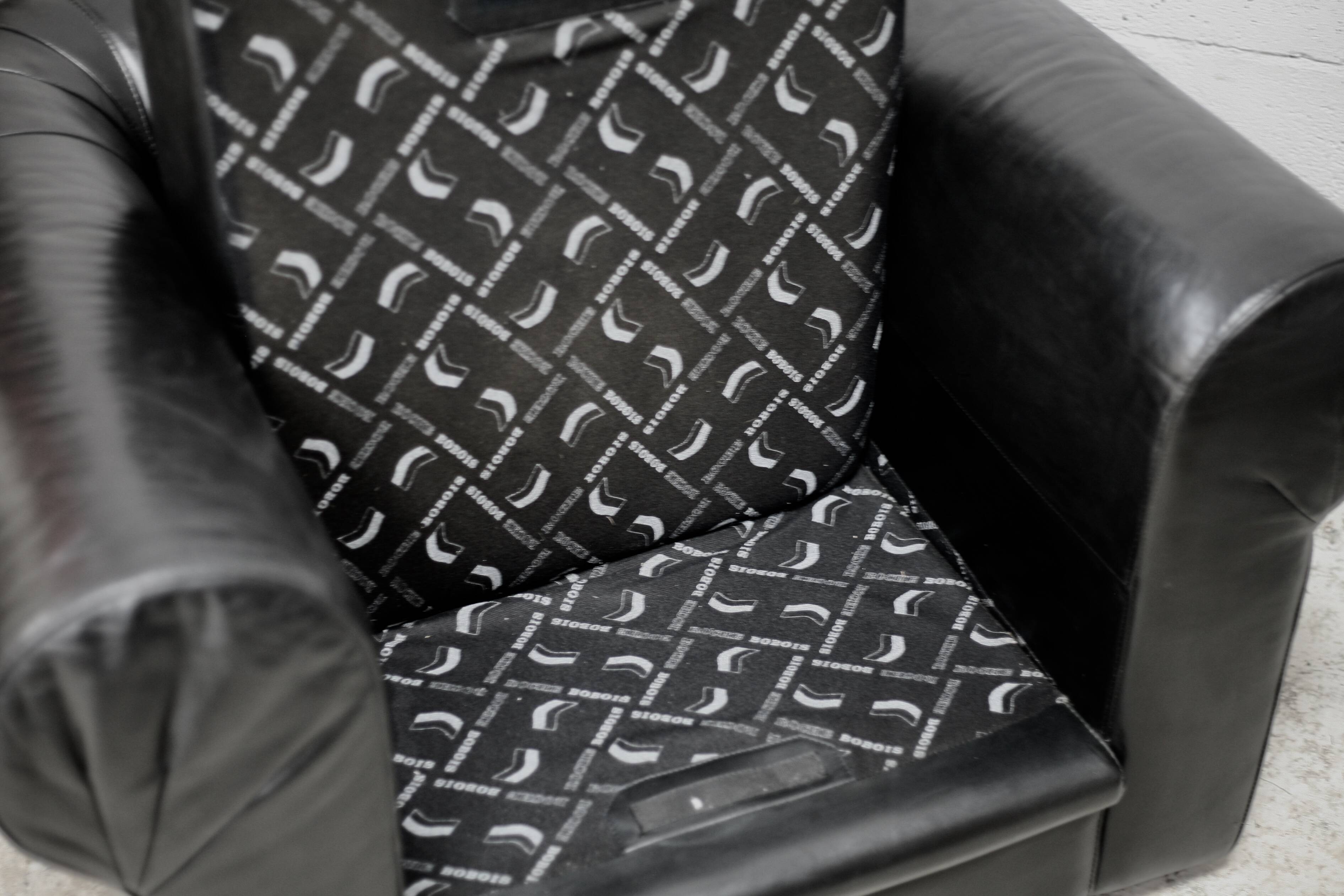 Large black leather armchair, France, 1980s