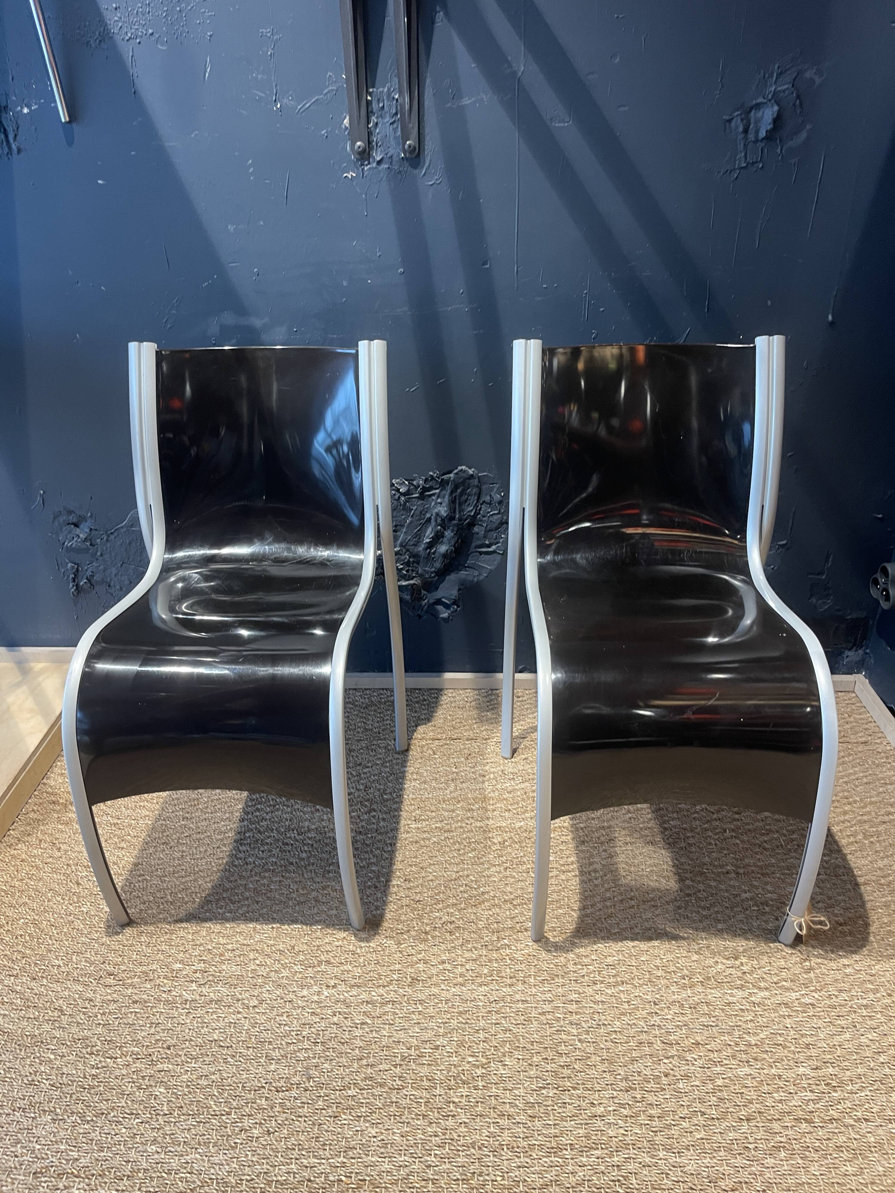 Pair of FPE chairs by Ron Arad for Kartell black Italy 2000s