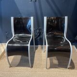 Pair of FPE chairs by Ron Arad for Kartell black Italy 2000s
