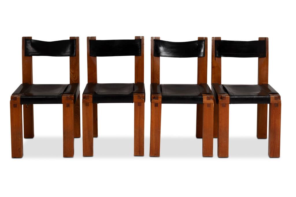 Pierre Chapo. Series of 8 "S11" chairs in elm and leather. 1960s-70s.