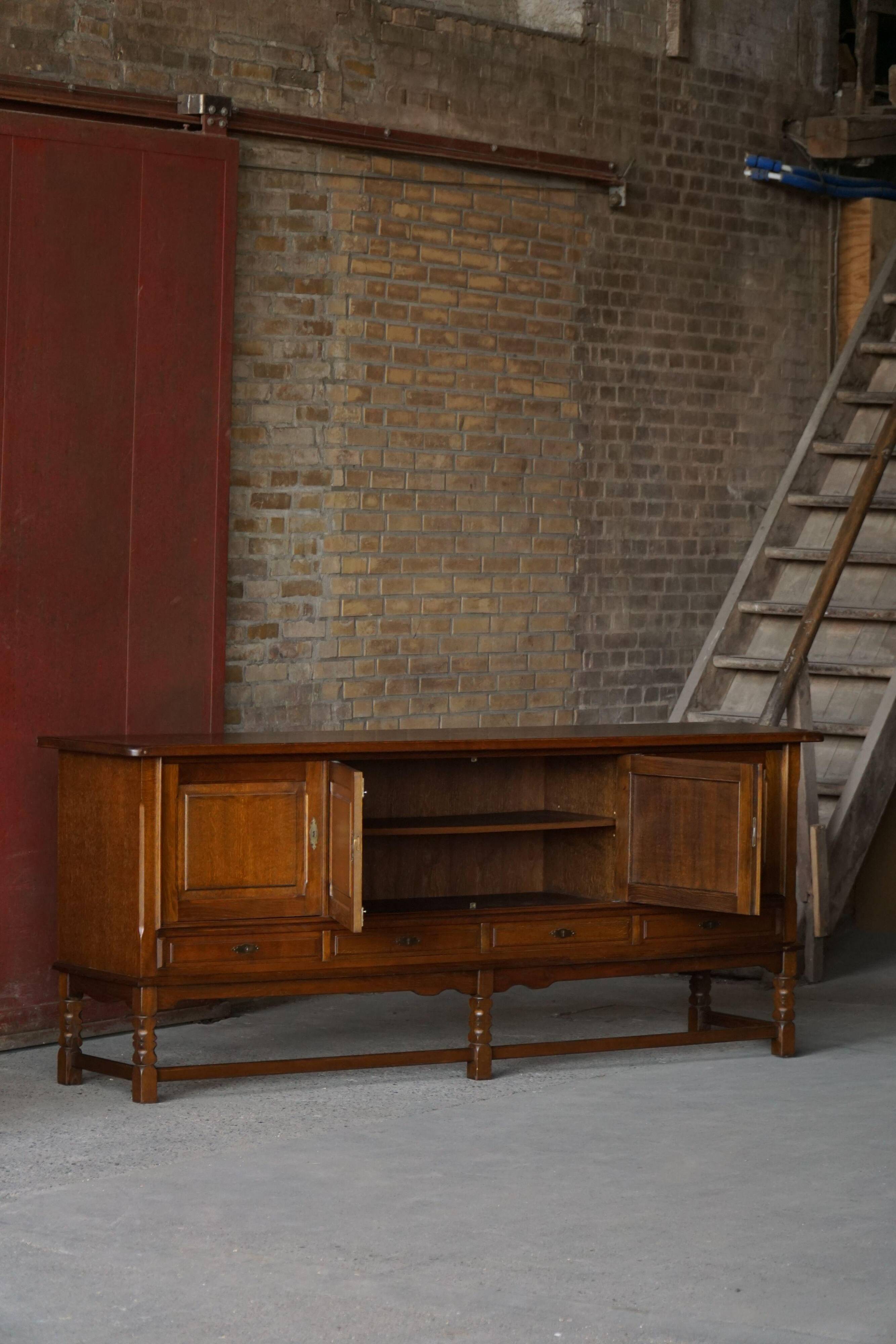 Danish enfilade from the mid-modern century in dark stained oak, 1960s.