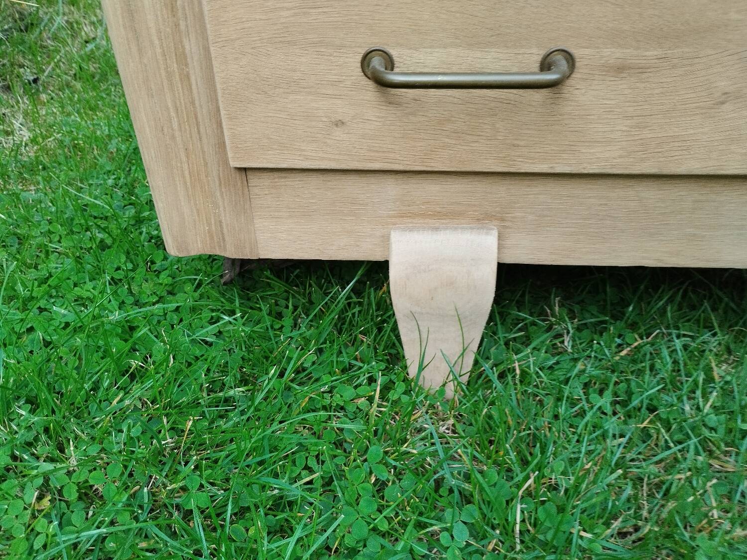 Old vintage chest of drawers with compass feet