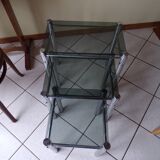 Pull-out tables in glass and metal 80 years