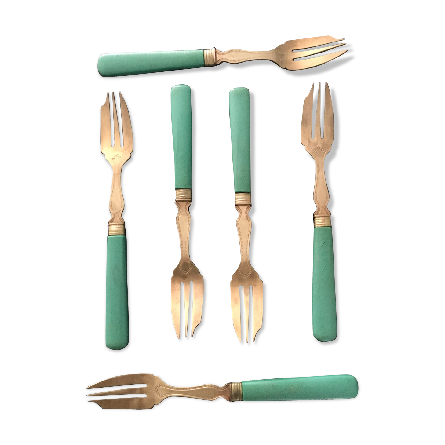 Set of brass dessert forks
