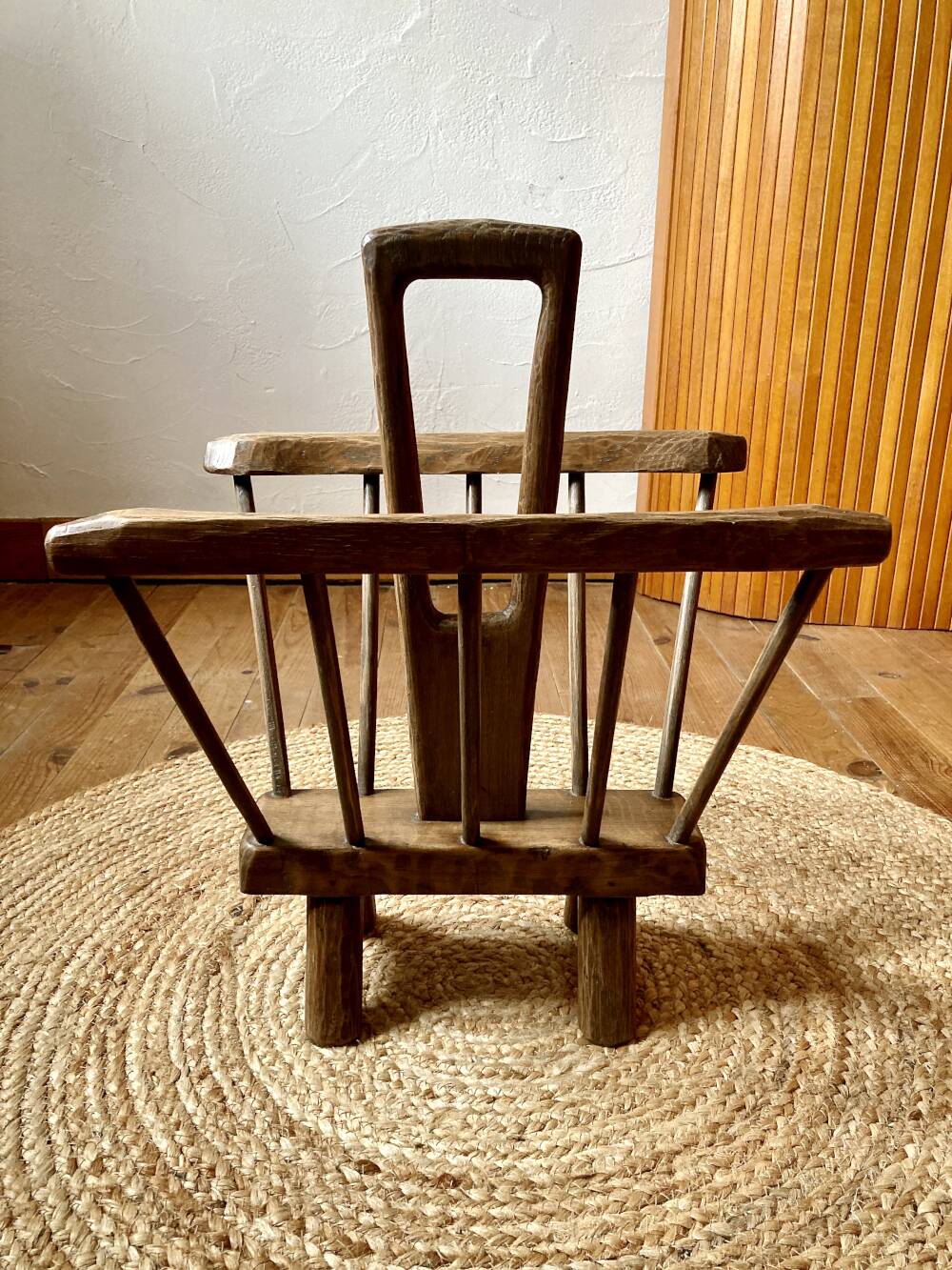 Brutalist magazine rack in the style of Jean Touret, 1950s.