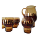 Carafe and its amber/golden glasses from the 70s.