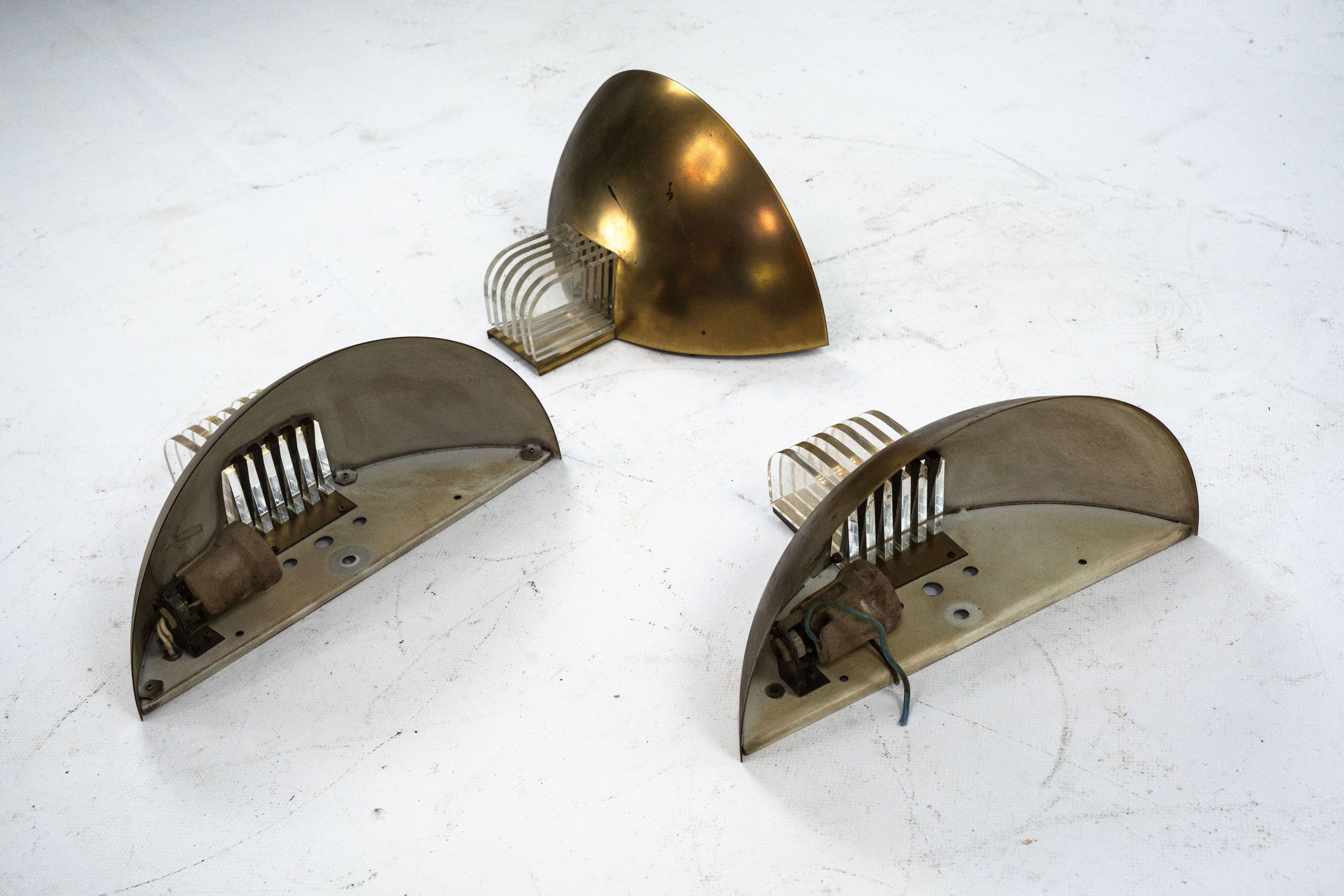 Set of three Italian Deco-style brass wall sconces, Italy 1970s