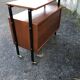 1960 wheeled furniture wood and black metal