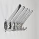 Up to 5 large Art Deco Bauhaus wall hooks in nickel and brass, Vienna, 1930s.