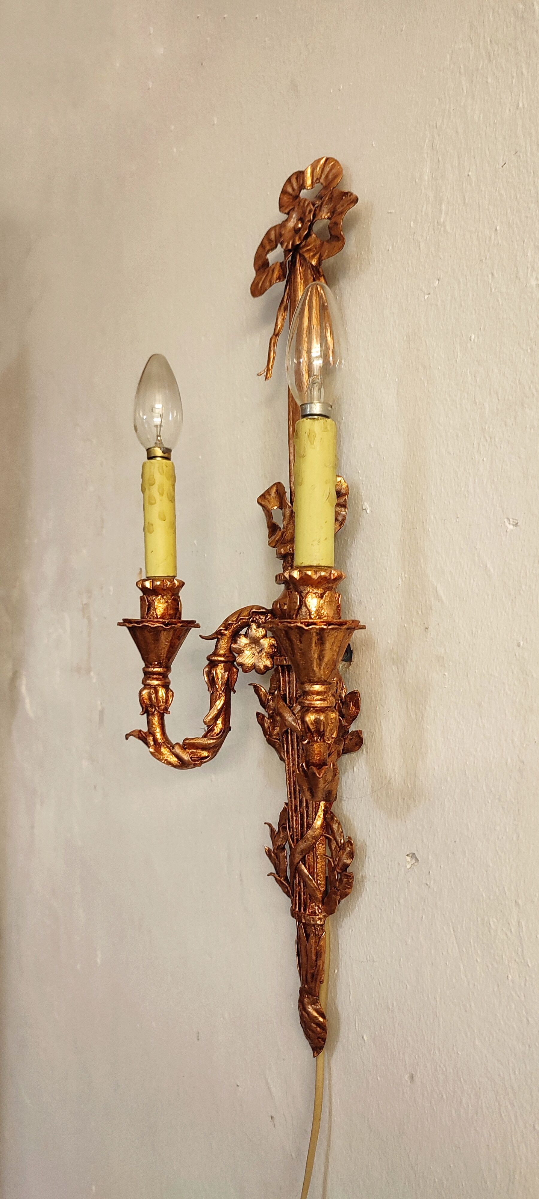 Wall lamp wrought iron and gold leaf. France, 1950s.