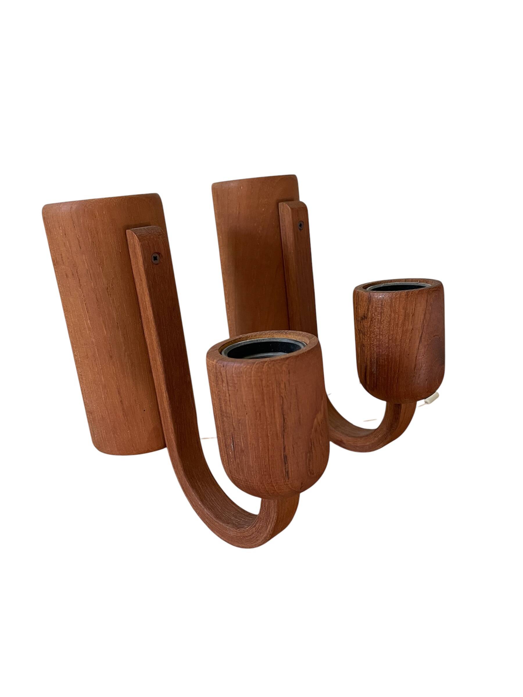 Pair of Scandinavian teak wall lights, Dolmus, 70s