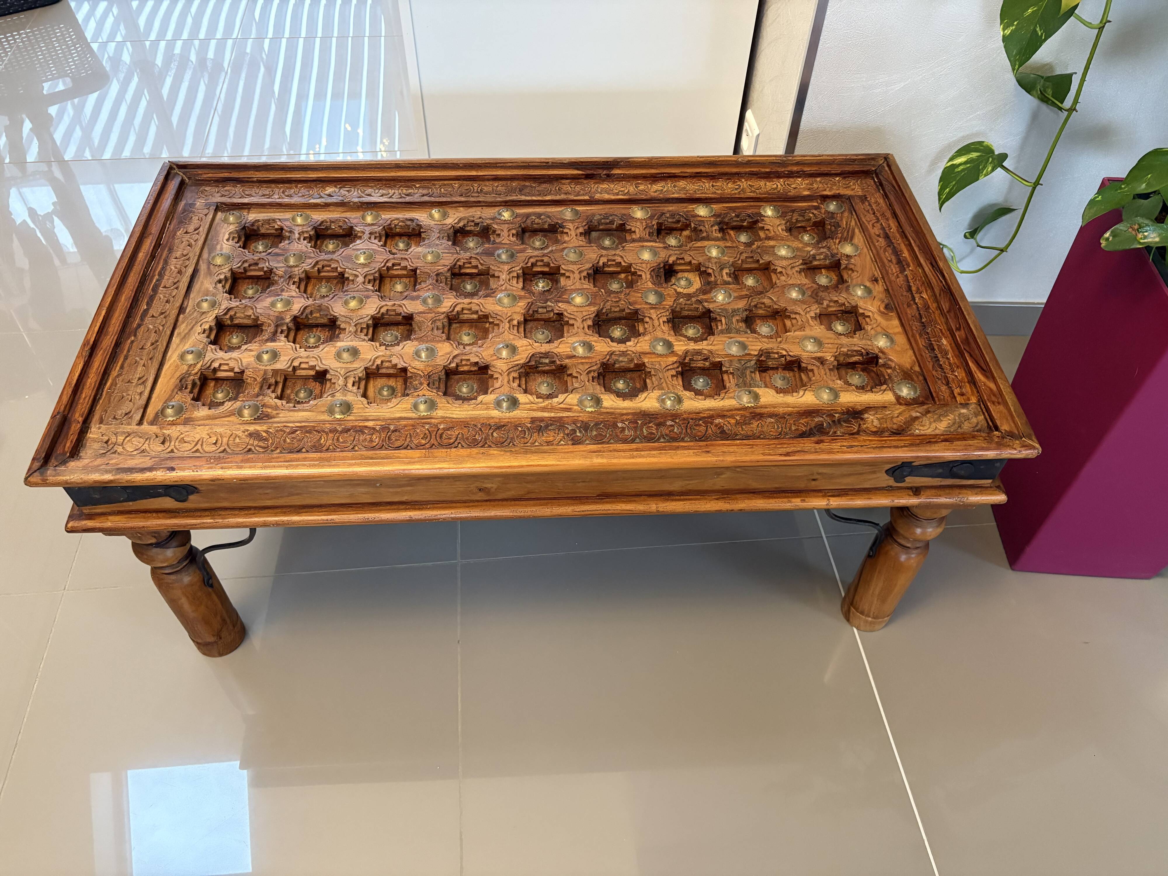 Solid oak carved coffee table with glass top