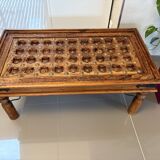 Solid oak carved coffee table with glass top