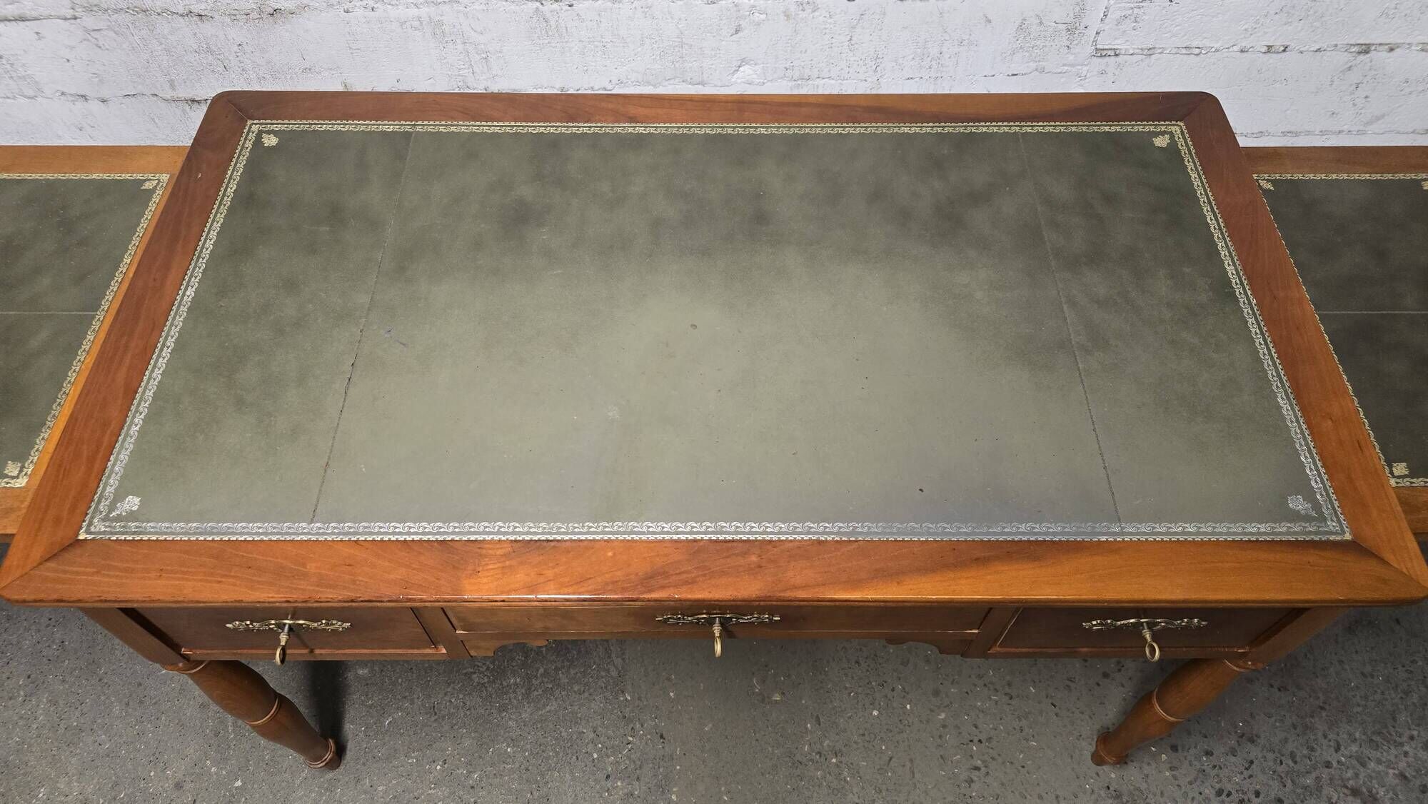 Flat leather desk, Louis-Philippe style, side pull-outs.