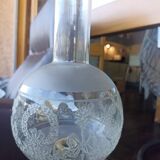 Old engraved globe oil lamp