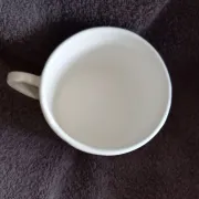 Large ceramic footed mug handcrafted in red.
