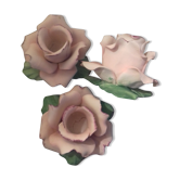 Suite of three omani pink candlesticks