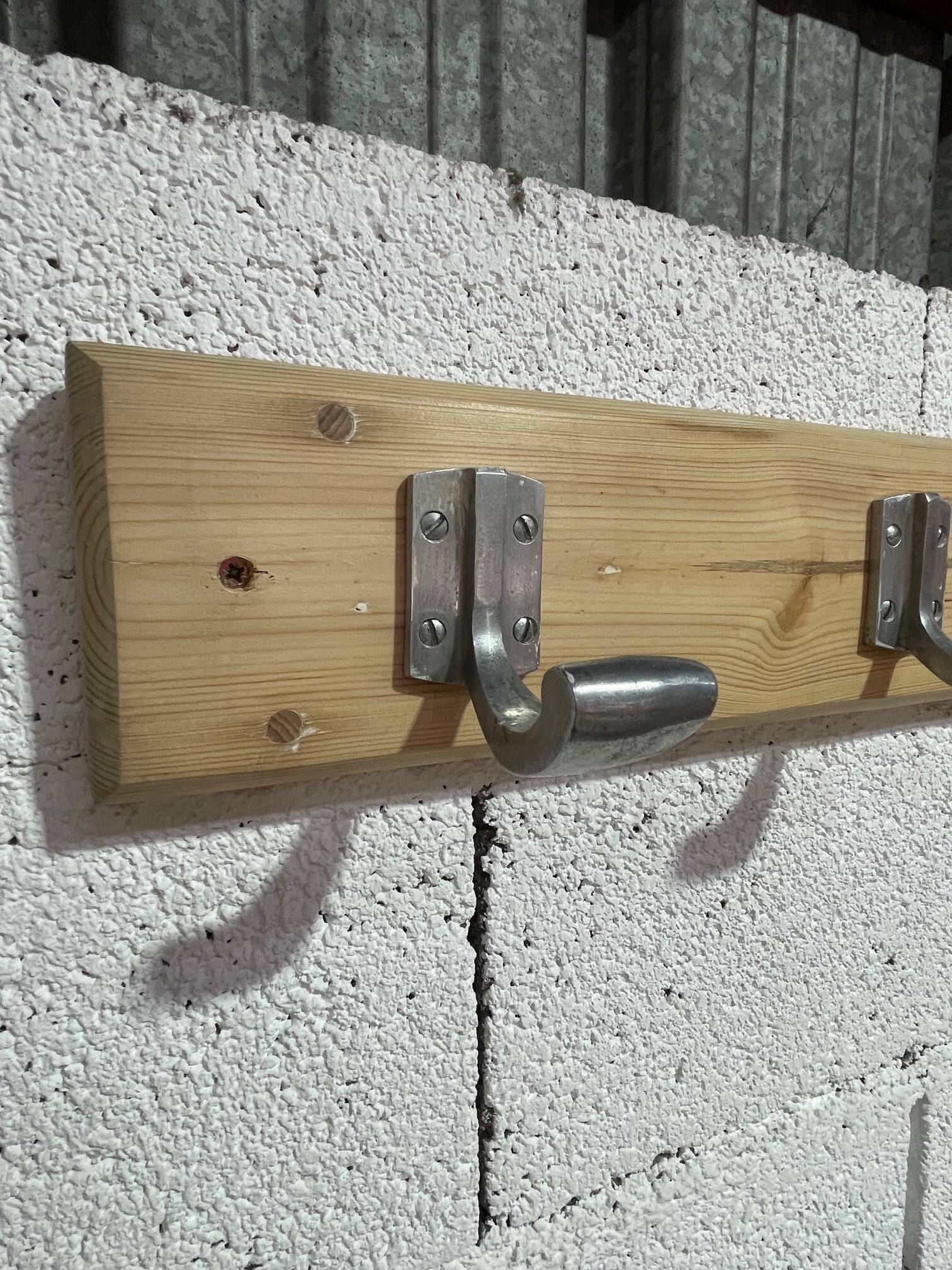 Vintage wall coat rack from the 1960s.