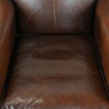 Sheepskin art deco design armchair with timeless and warm colours