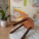 Old farm stool, wooden tripod campaign