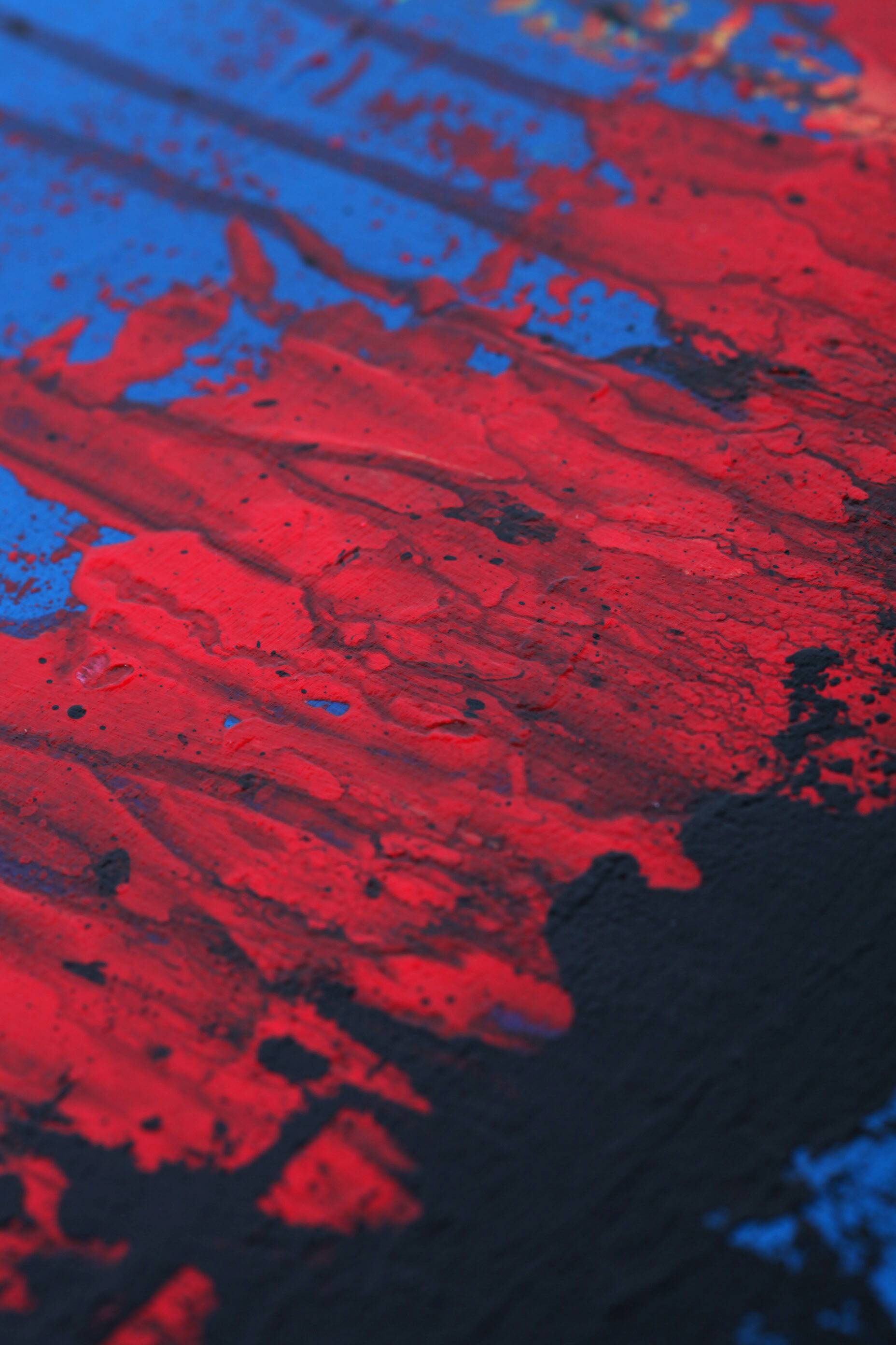 Contemporary abstract artwork in blue, red,black, yelow on stretched canvas