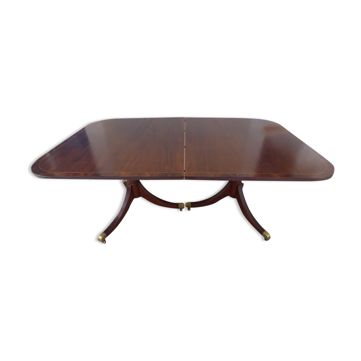 Mahogany top table inlaid with light wood nets and brass toes