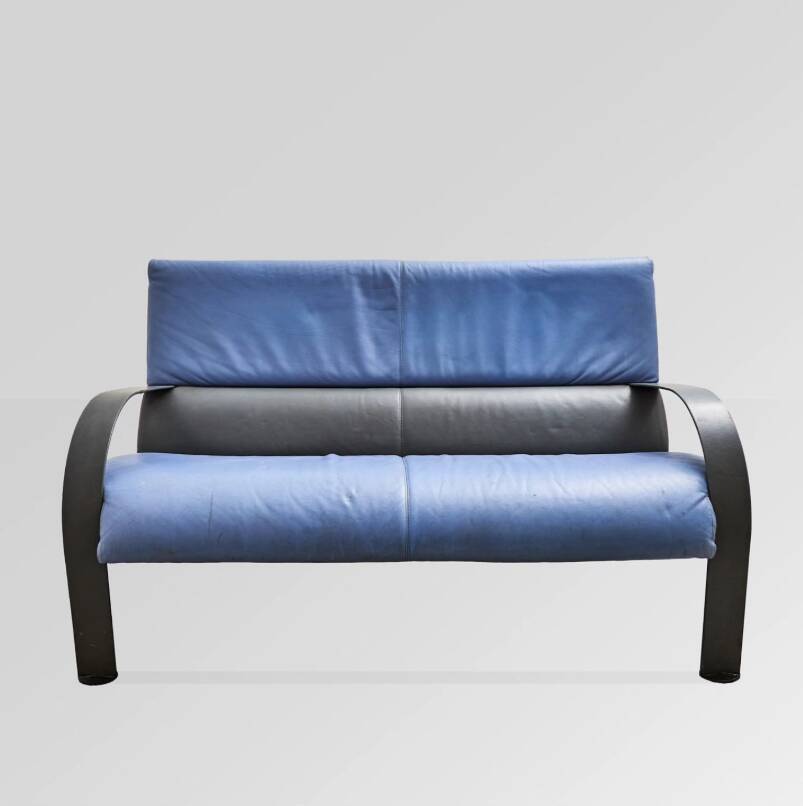 Two-seater sofa in polychrome leather and metal by Poltrona Frau