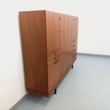 High Scandinavian modernist vintage sideboard in teak and black metal.